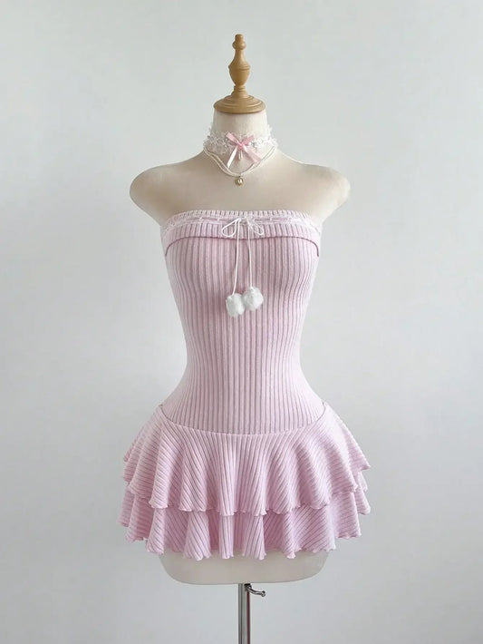 Knit ruffle hem pom pom mini dress