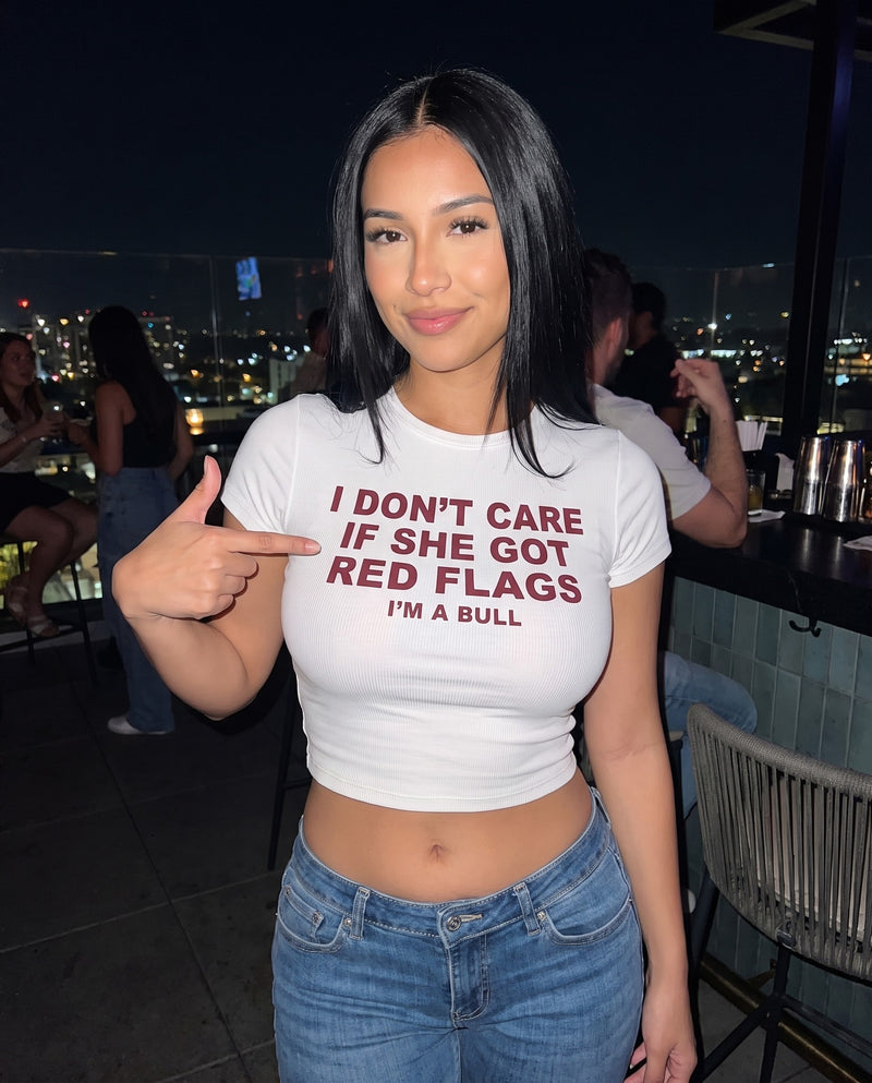 I Don't Care If She Got Red Flags I'm A Bull Baby Tee - Fitted Rib